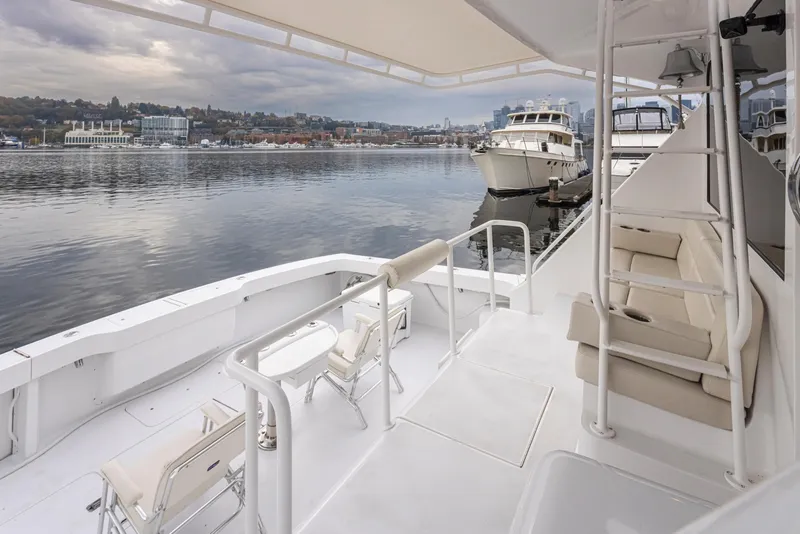 Slide: The Image of Viking 72 Convertible 2000 yacht docked with spacious deck and waterfront view. - 35