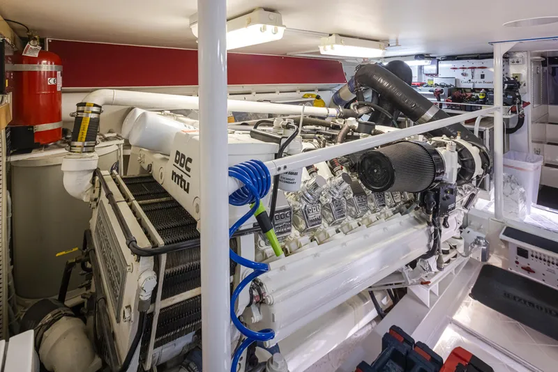 Slide: The Image of Engine room of a 2000 Viking 72 Convertible yacht with MTU engine. - 48