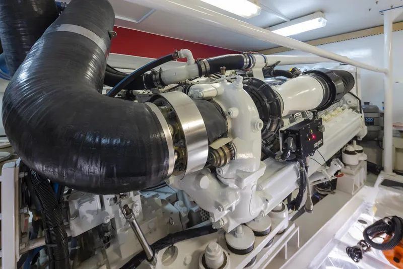 Slide: The Image of Engine room of a 2000 Viking 72 Convertible yacht. - 49