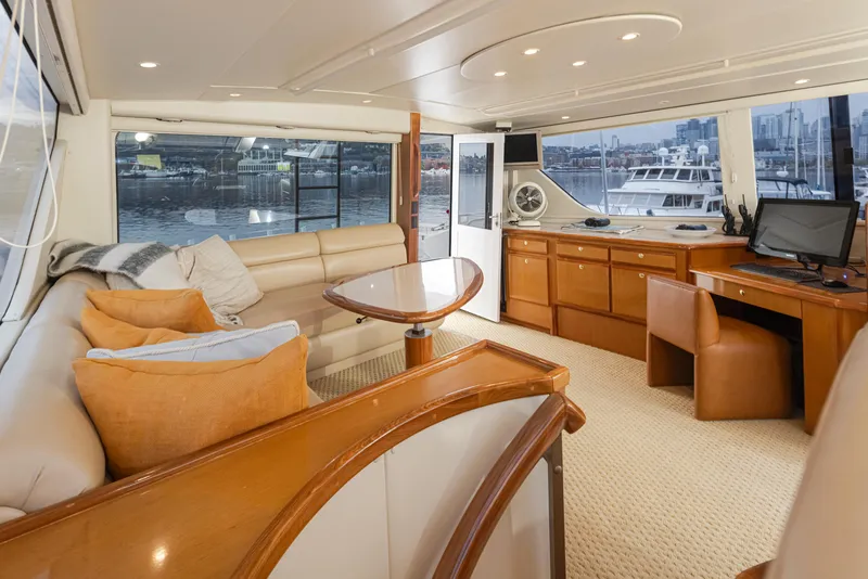 Slide: The Image of Luxurious interior of a 2000 Viking 72 Convertible yacht with modern furnishings. - 9
