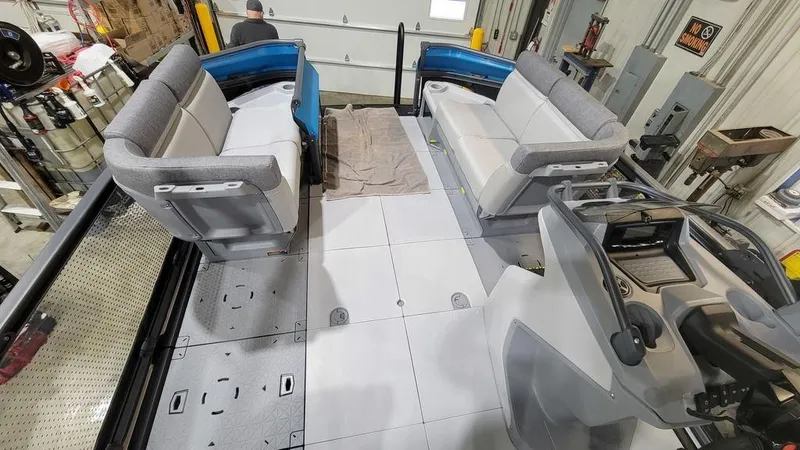 Slide: The Image of 2023 Sea-Doo Switch® Cruise 18-170 hp interior with seating and control console. - 2