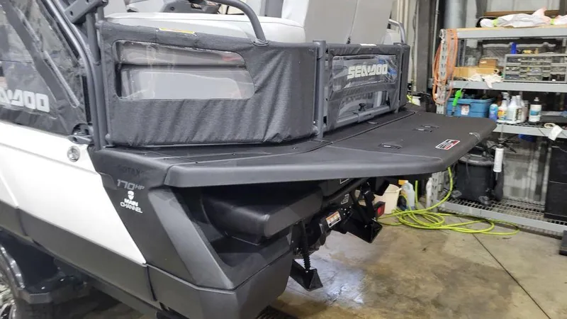 Slide: The Image of 2023 Sea-Doo Switch® Cruise 18-170 hp in a garage, rear view. - 8