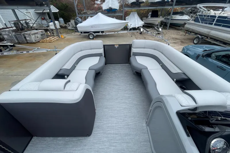 Slide: The Image of 2023 Godfrey Monaco 235 SFL pontoon boat interior with spacious seating. - 10