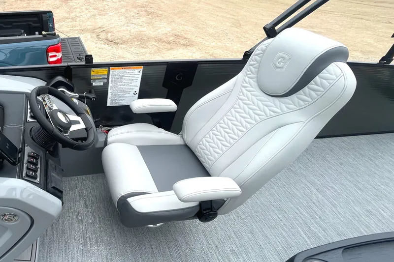 Slide: The Image of 2023 Godfrey Monaco 235 SFL captain's chair and helm station. - 14