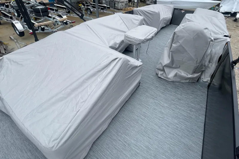 Slide: The Image of 2023 Godfrey Monaco 235 SFL pontoon boat with covered seating and equipment. - 15