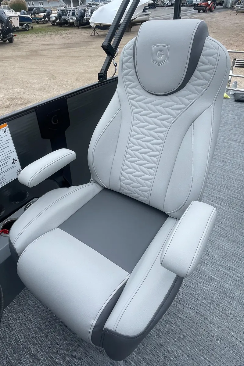 Slide: The Image of 2023 Godfrey Monaco 235 SFL captain's chair, luxurious gray upholstery, ergonomic design. - 21