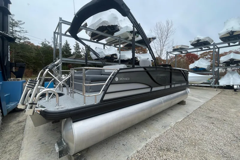Slide: The Image of 2023 Godfrey Monaco 235 SFL pontoon boat in storage yard. - 6