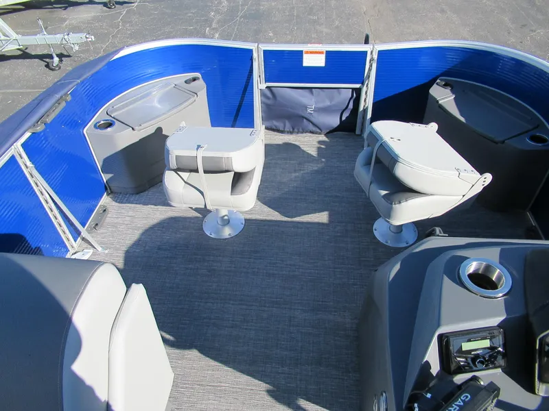 Slide: The Image of 2024 Bennington 188 SVF boat interior with seating and storage compartments. - 5