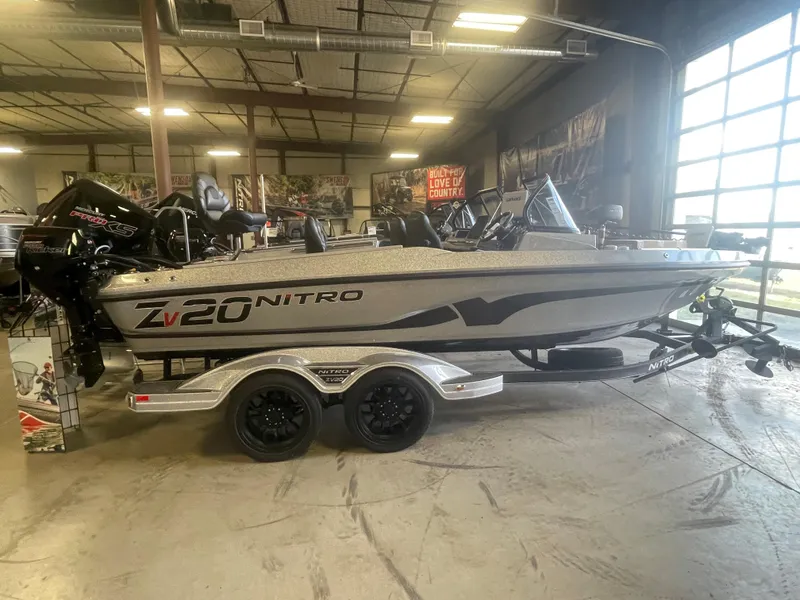Slide: The Image of 2024 Nitro ZV20 Pro fishing boat on a trailer in a showroom. - 4