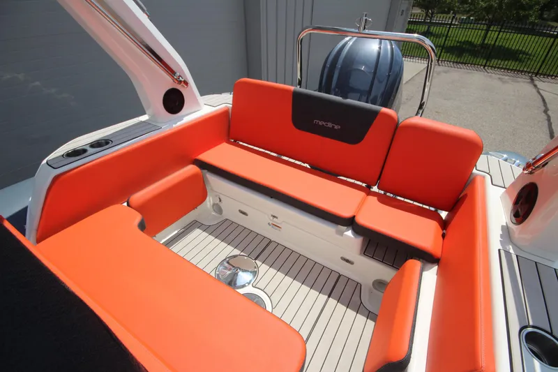 Slide: The Image of 2024 Zodiac Medline 7.5 boat with vibrant orange seating and sleek design. - 10