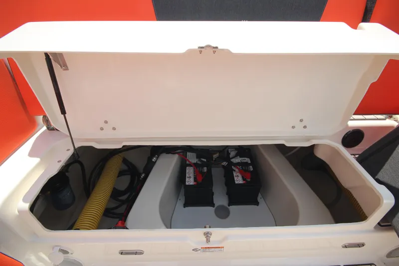 Slide: The Image of 2024 Zodiac Medline 7.5 NEO boat storage compartment with batteries and equipment. - 20