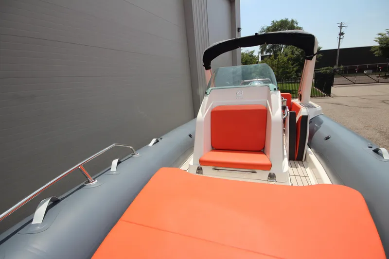 Slide: The Image of 2024 Zodiac Medline 7.5 NEO boat with orange seating, in stock. - 30