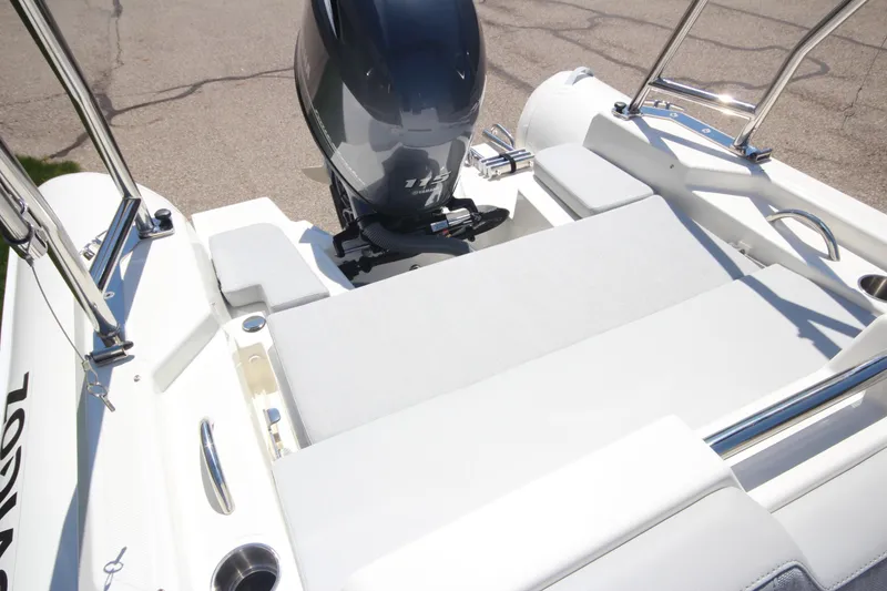Slide: The Image of 2025 Zodiac Medline 5.8 NEO boat with 115hp engine, featuring sleek seating and stainless steel details. - 23