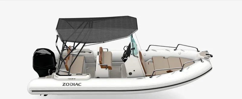 Slide: The Image of 2025 Zodiac Medline 5.8 NEO boat with canopy, sleek design, and spacious seating. - 39