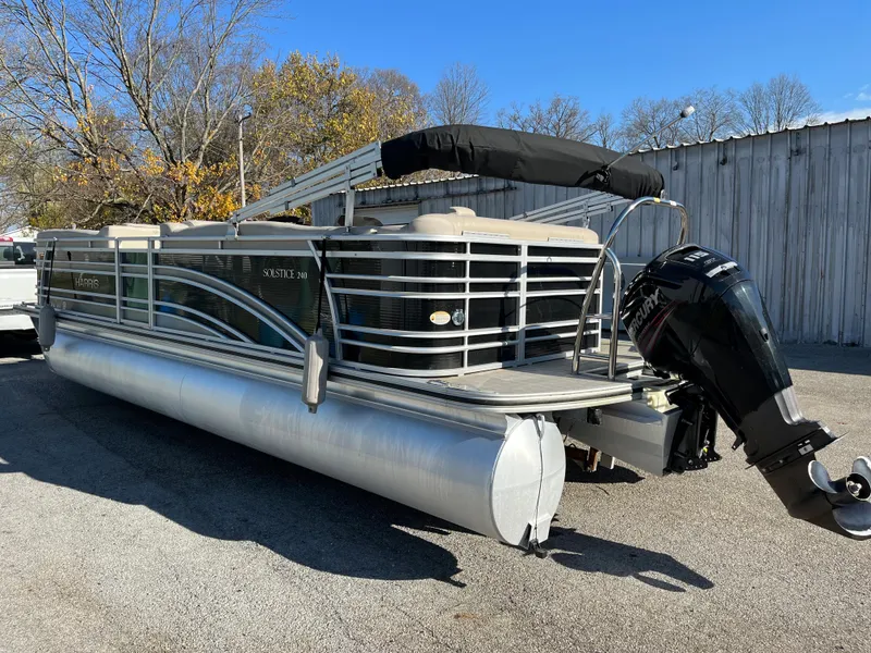 Slide: The Image of 2016 Harris Solstice 240 pontoon boat with outboard motor. - 4