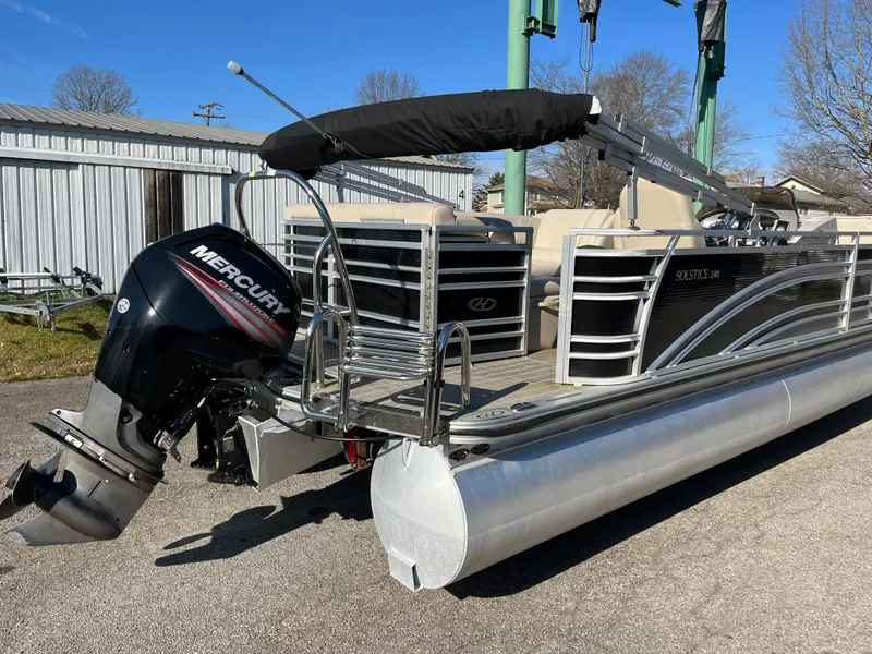 Slide: The Image of 2016 Harris Solstice 240 pontoon boat with Mercury outboard motor. - 5
