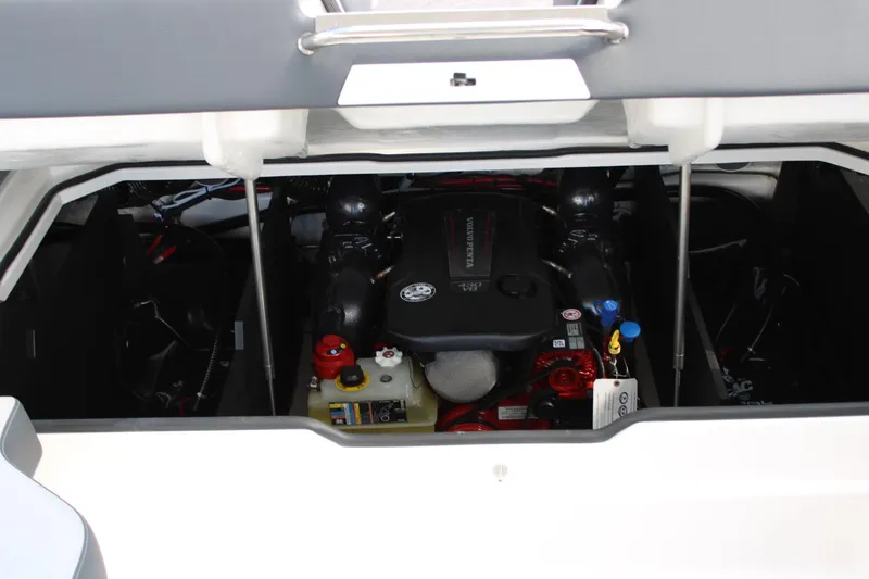 Slide: The Image of 2024 Regal LS9 Surf boat engine compartment with Volvo Penta engine. - 12
