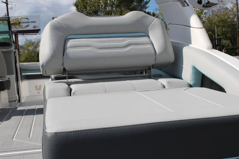 Slide: The Image of 2024 Regal LS9 Surf boat interior with luxurious seating and modern design. - 15