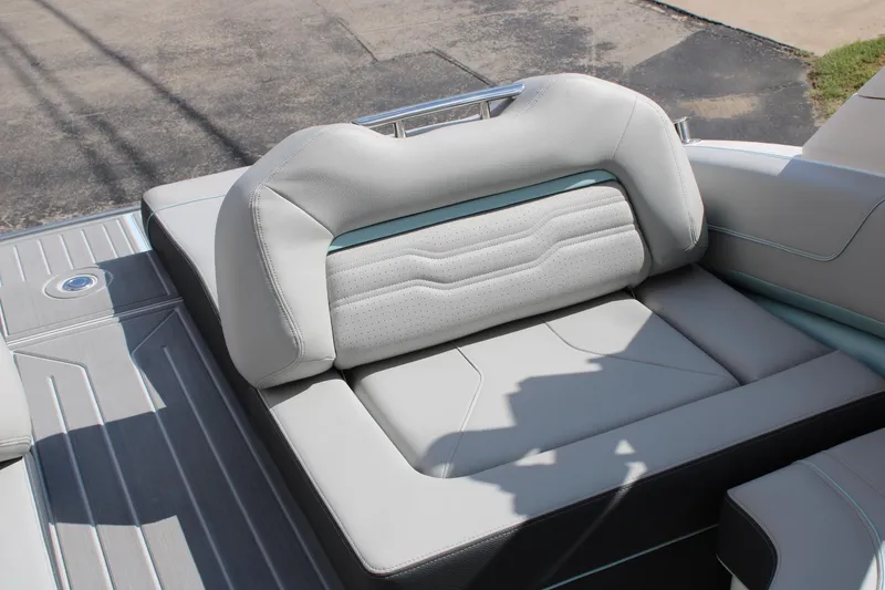 Slide: The Image of 2024 Regal LS9 Surf boat with luxurious seating and modern design. - 17