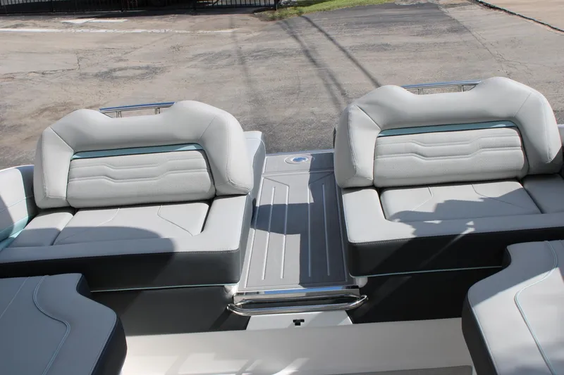 Slide: The Image of 2024 Regal LS9 Surf boat with luxurious rear seating and modern design. - 18
