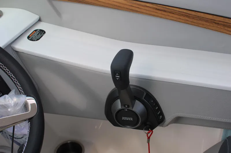 Slide: The Image of 2024 Regal LS9 Surf boat throttle control with Volvo Penta lever. - 32