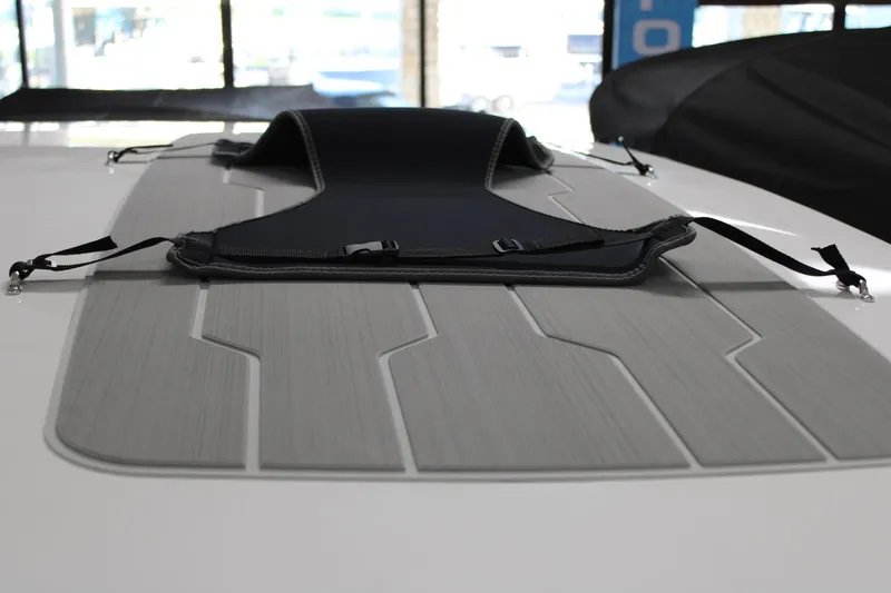 Slide: The Image of 2024 Regal LS9 Surf boat deck with padded seat and straps. - 45