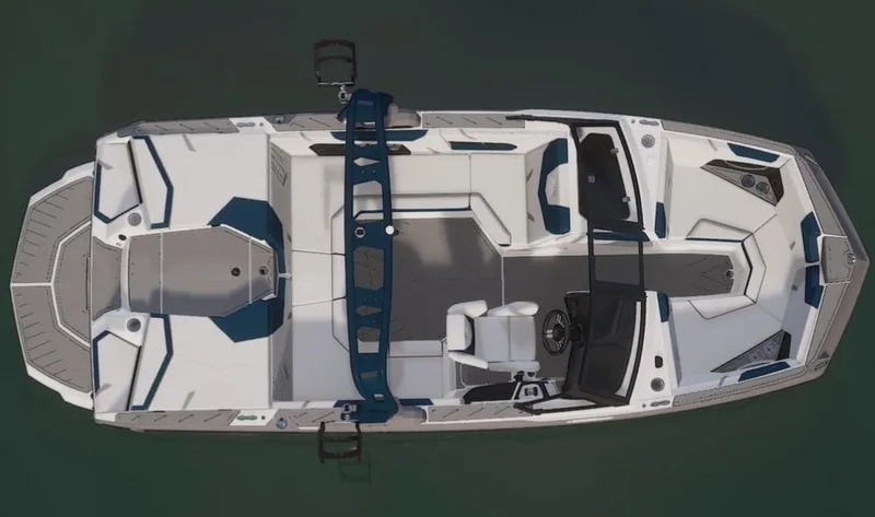 Slide: The Image of 2024 Nautique Super Air GS20 boat, top view, white and blue interior. - 14
