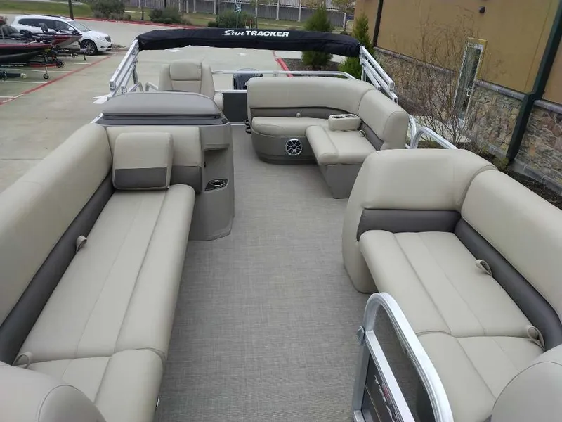 Slide: The Image of 2024 Sun Tracker Party Barge 18 DLX pontoon boat with spacious seating and modern design. - 9