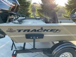 The Image of 2024 Tracker Grizzly 1754 SC boat on trailer, side view, outdoors. - 0