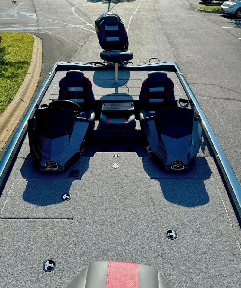 Slide: The Image of 2024 Ranger RT198P boat interior with seating and control panels. - 4