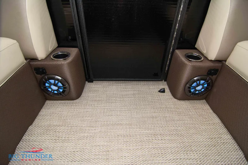 Slide: The Image of Interior of 2023 Crest Classic DLX 240 SLC with speakers and cup holders. - 12