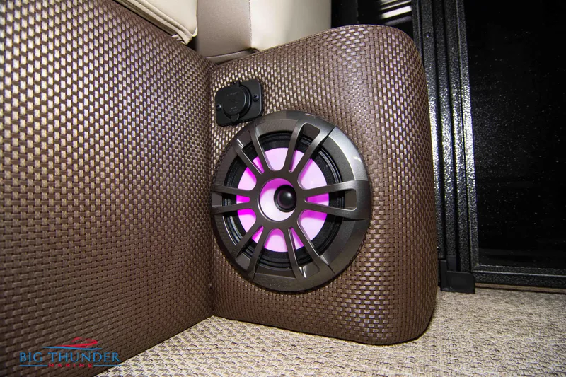 Slide: The Image of 2023 Crest Classic DLX 240 SLC boat interior speaker with purple LED lighting. - 15