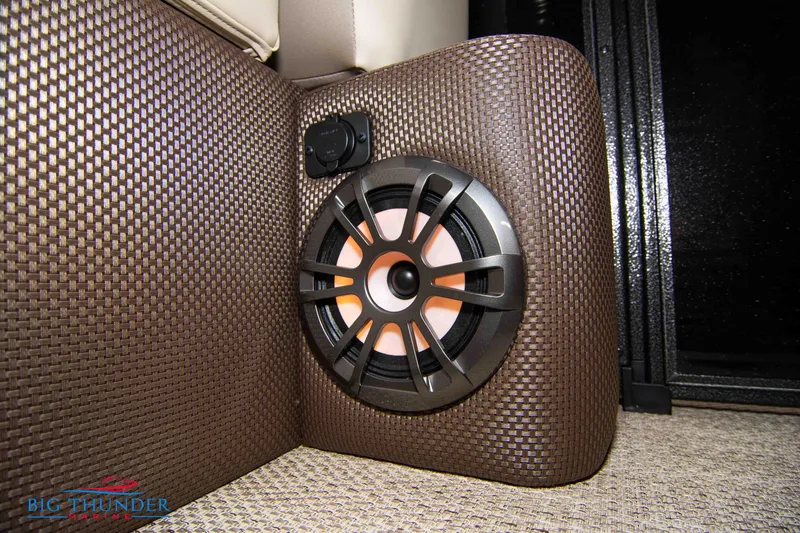 Slide: The Image of 2023 Crest Classic DLX 240 SLC boat speaker and USB port detail. - 17