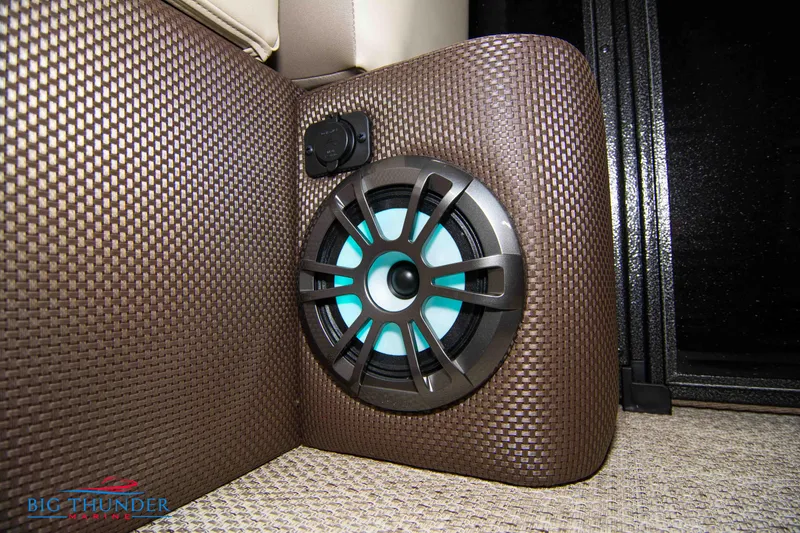 Slide: The Image of 2023 Crest Classic DLX 240 SLC boat interior speaker with blue LED lighting. - 21