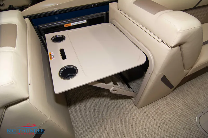 Slide: The Image of Foldable table with cup holders in 2023 Crest Classic DLX 240 SLC pontoon boat. - 32