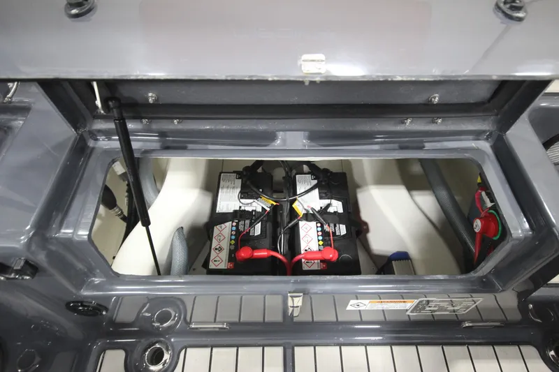 Slide: The Image of 2024 Zodiac Medline 6.8 NEO 250hp boat battery compartment. - 21