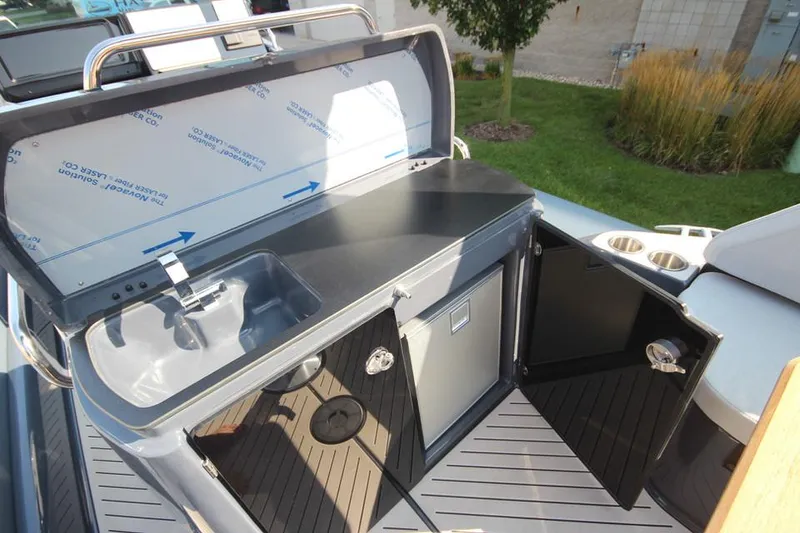 Slide: The Image of 2024 Zodiac MEDLINE 9 NEO boat kitchenette with sink and storage. - 17