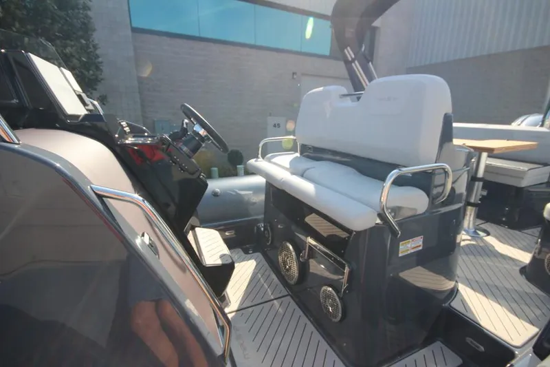 Slide: The Image of 2024 Zodiac MEDLINE 9 NEO boat interior with twin 300hp engines, featuring modern seating. - 19