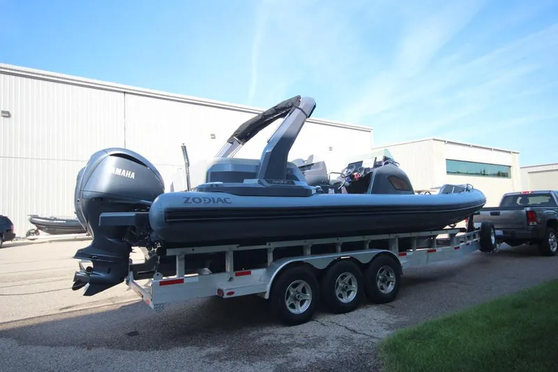 Slide: The Image of 2024 Zodiac MEDLINE 9 NEO boat with twin 300hp engines on a trailer. - 3