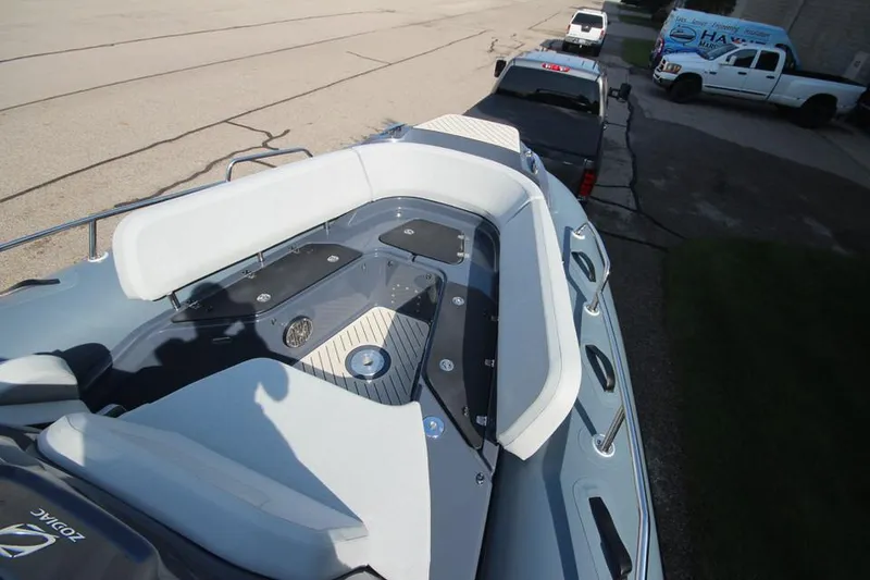 Slide: The Image of 2024 Zodiac MEDLINE 9 NEO boat, sleek design, spacious seating, parked on trailer. - 30