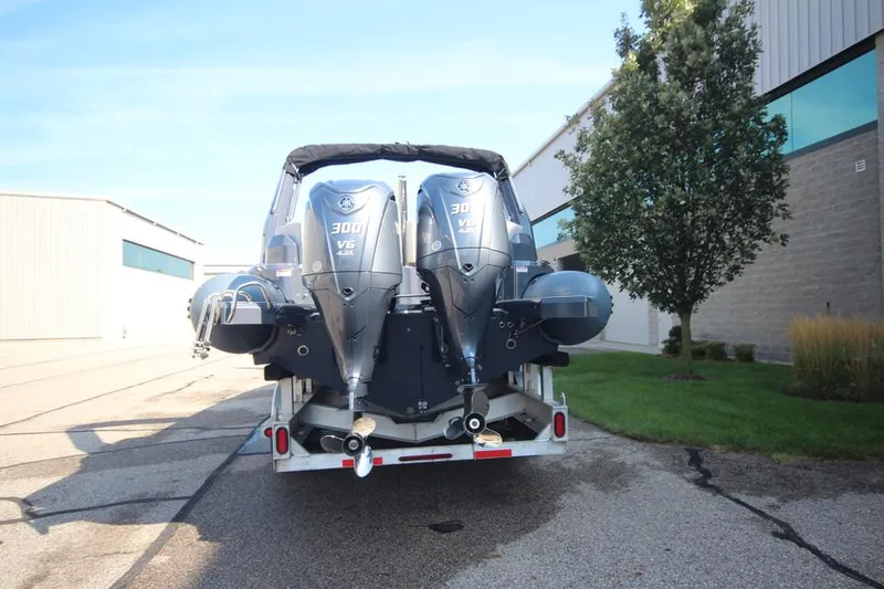 Slide: The Image of 2024 Zodiac MEDLINE 9 NEO boat with twin 300hp engines on trailer. - 4