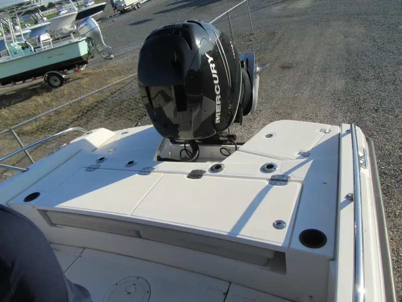Slide: The Image of 2019 Boston Whaler 240 Dauntless T-top with rod holders. - 11