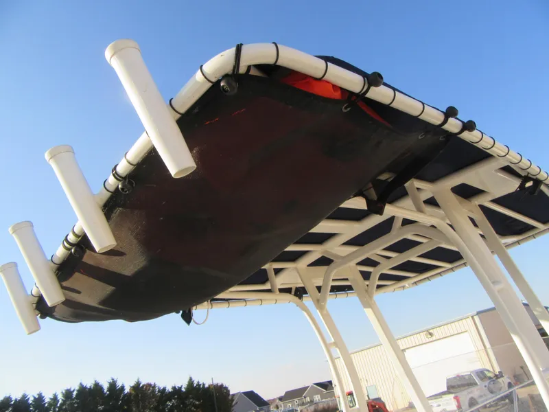 Slide: The Image of 2019 Boston Whaler 240 Dauntless boat seat, beige upholstery, sleek design. - 12