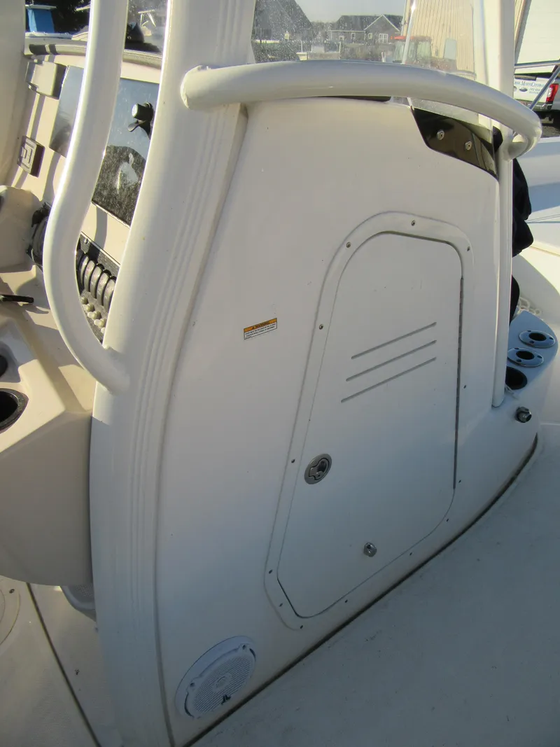 Slide: The Image of Interior of 2019 Boston Whaler 240 Dauntless boat with storage compartment. - 18