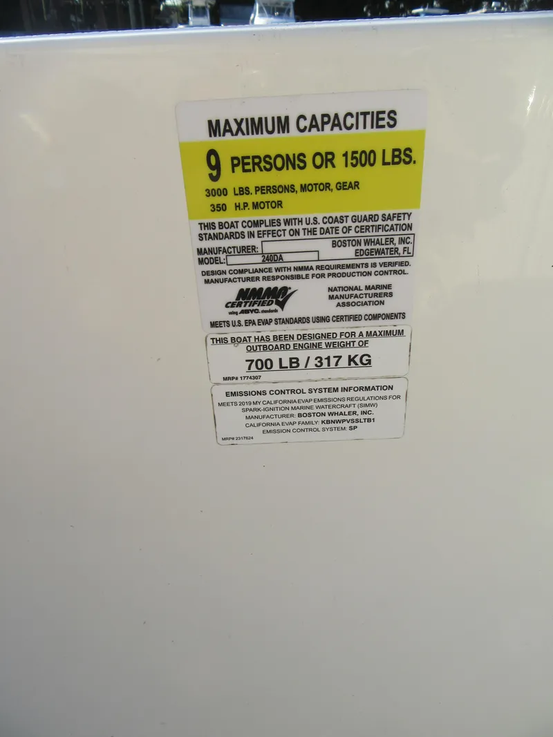Slide: The Image of 2019 Boston Whaler 240 Dauntless capacity label, 9 persons or 1500 lbs. - 22