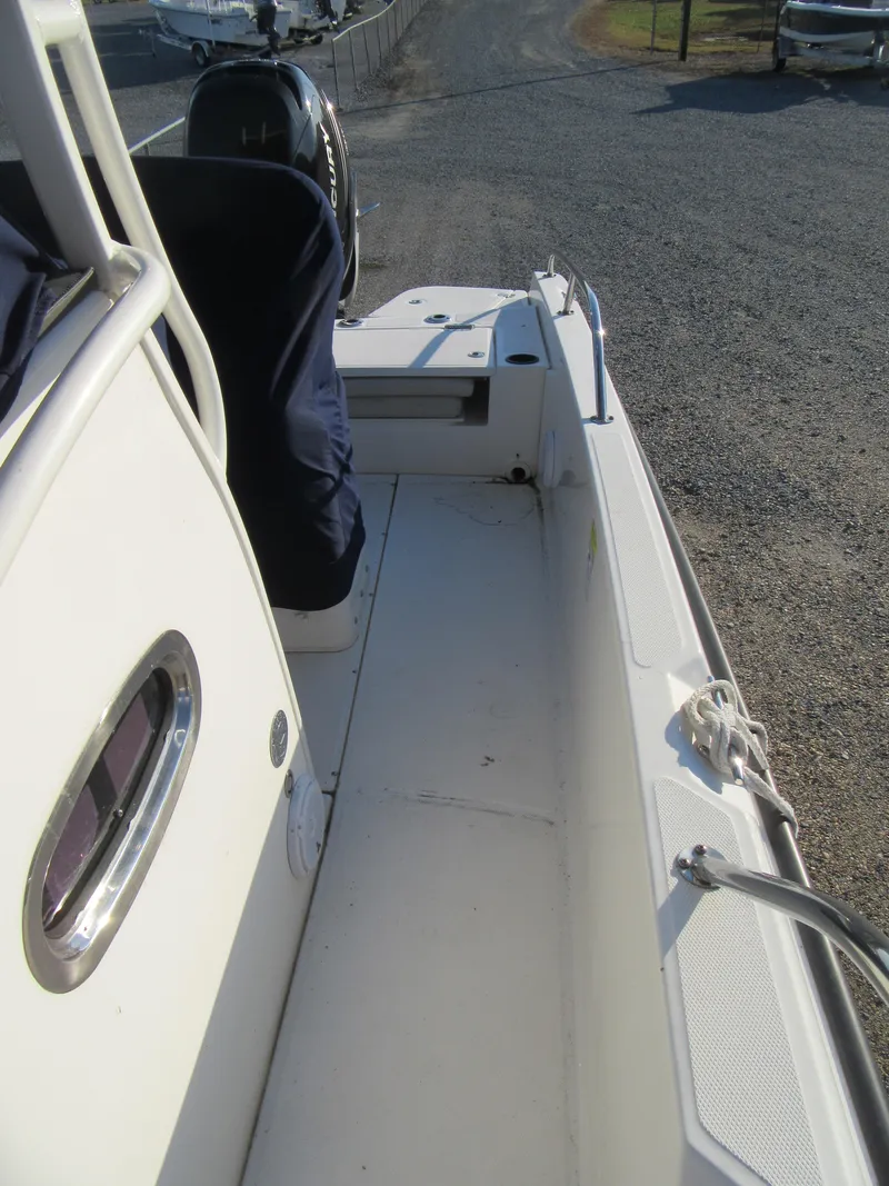Slide: The Image of 2019 Boston Whaler 240 Dauntless with covered console. - 8