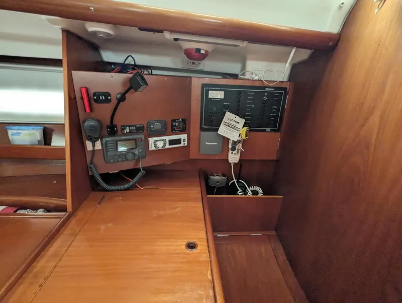 Slide: The Image of Control panel of a 2005 Beneteau 393 sailboat with navigation equipment. - 7