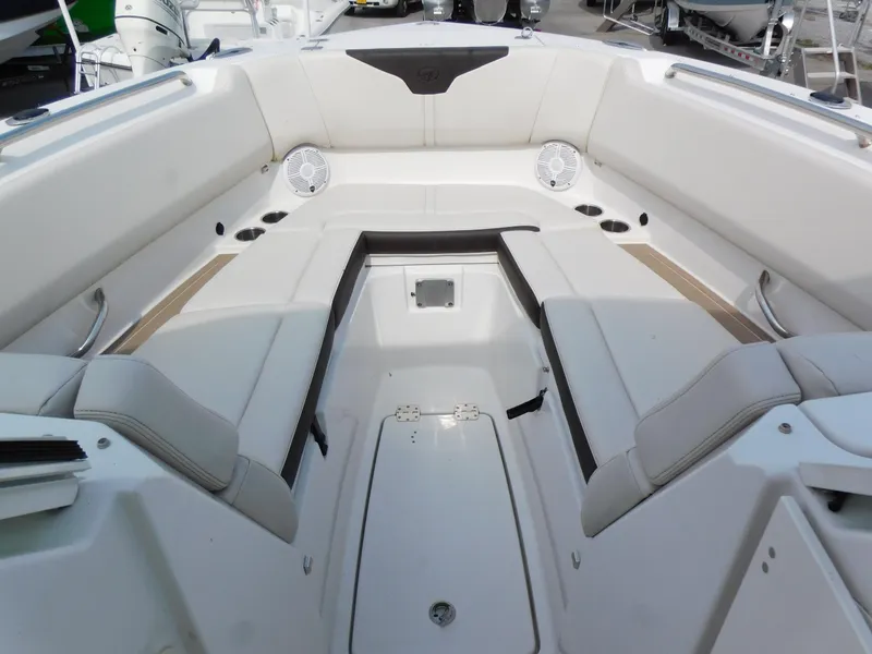 Slide: The Image of 2024 Sailfish 276 DC boat interior with spacious seating and storage. - 10