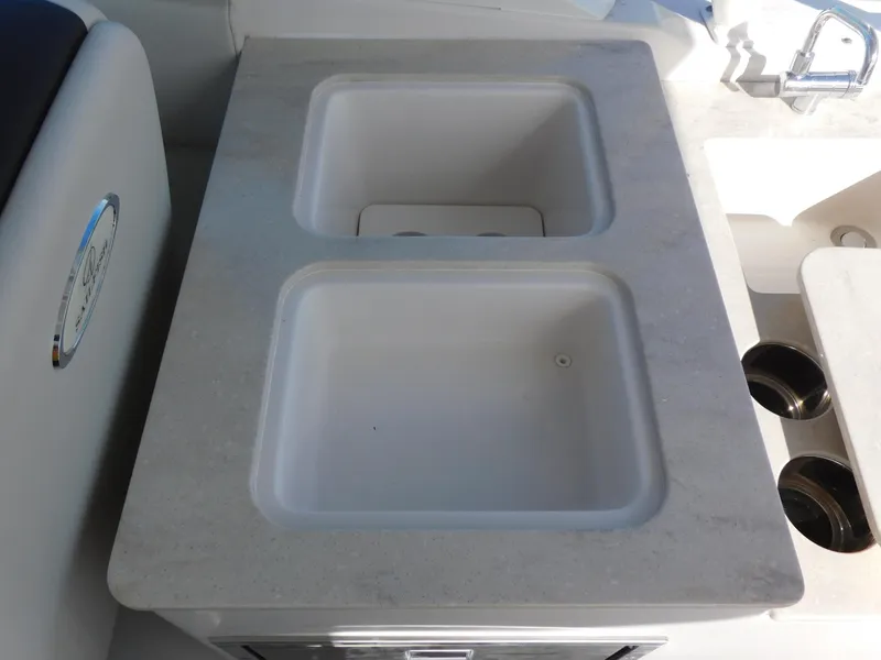 Slide: The Image of Dual sink setup on 2024 Sailfish 276 DC boat. - 14