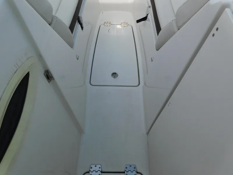 Slide: The Image of 2024 Sailfish 276 DC boat interior with seating and storage compartments - 28